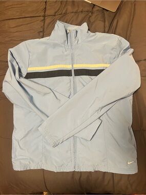 Nike Pale Blue Zip-Up Track Jacket with Black and Yellow Chest Stripes